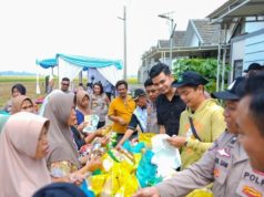 Kapolres Karawang Hadiri Penanaman Jagung Serentak Dukung Swasembada Pangan 2025 Penanaman Jagung Serentak di Karawang Wujud Dukung Ketahanan Pangan Nasional. (AlexaPodcast.ID)