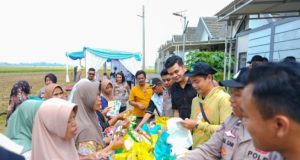 Kapolres Karawang Hadiri Penanaman Jagung Serentak Dukung Swasembada Pangan 2025 Penanaman Jagung Serentak di Karawang Wujud Dukung Ketahanan Pangan Nasional. (AlexaPodcast.ID)
