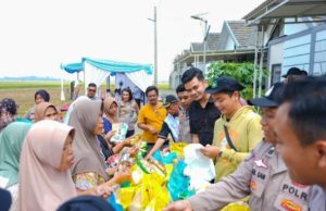Kapolres Karawang Hadiri Penanaman Jagung Serentak Dukung Swasembada Pangan 2025 Penanaman Jagung Serentak di Karawang Wujud Dukung Ketahanan Pangan Nasional. (AlexaPodcast.ID)