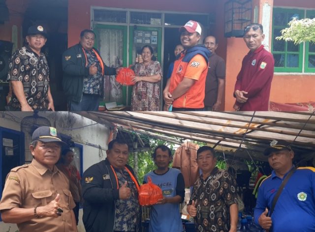 Kades Sampalan, Jamaludin, Beri bantuan warga terdampak banjir. (AlexaPodcast.ID) Kades Sampalan, Jamaludin, Beri bantuan warga terdampak banjir. (AlexaPodcast.ID)