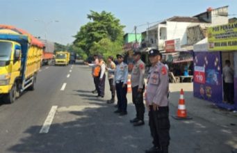 Antisipasi Lonjakan Mudik, 24 Personel Polres Karawang Siaga di Pos Pam Tanjung Pura Pos Pam Tanjung Pura Jadi Titik Krusial Mudik. (AlexaPodcast.ID)